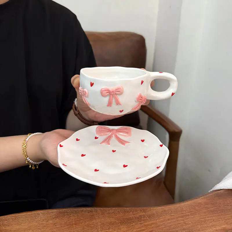Wholesale Round Ceramic Bow Mug with Saucer