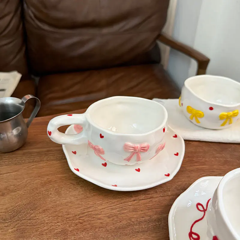 Wholesale Round Ceramic Bow Mug with Saucer - Image 3